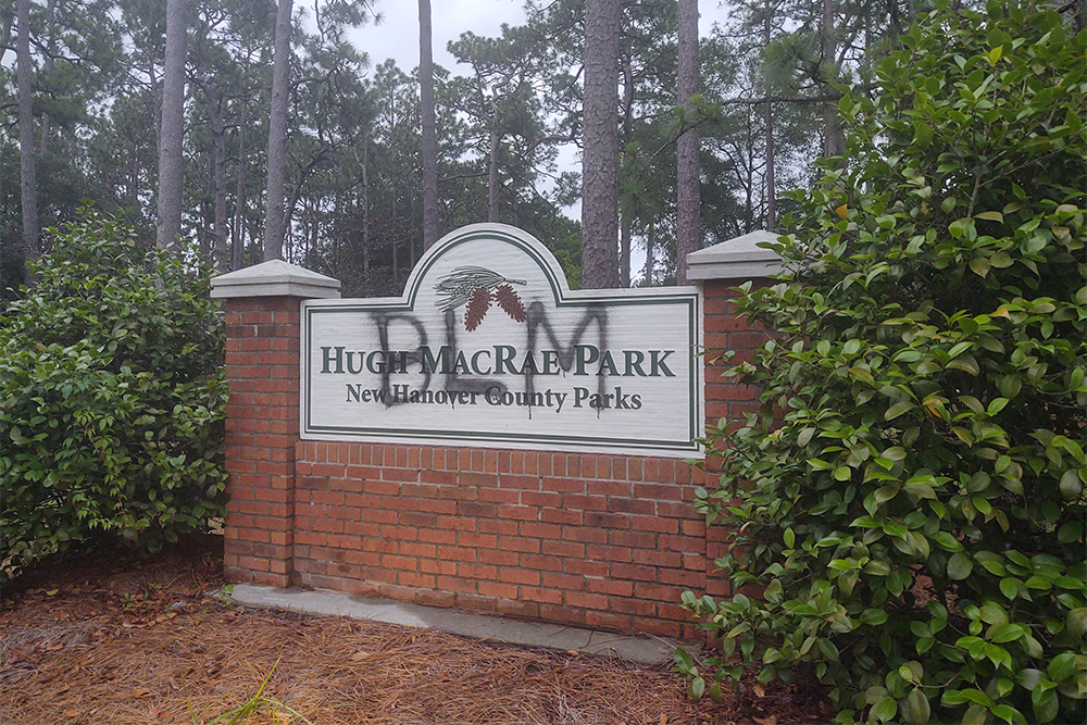 The signs were vandalized last week with the Black Lives Matter acronym, as seen in this June 15 photo. (Port City Daily/Contributed photo)