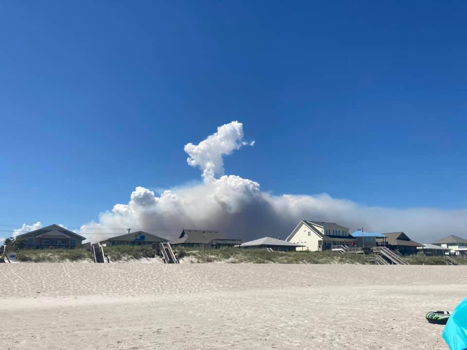 A controlled burn in Holly Shelter Game Land as seen from Topsail Island. (Port City Daily photo/Courtesy Sybil Scota)