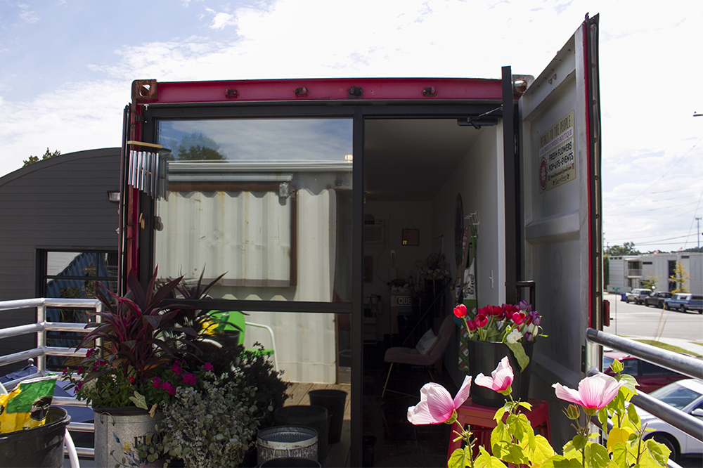 Petals To The People has taken over a renovated shipping container in the Outpost, the Cargo District's new incubator hub. (Port City Daily photo/Johanna F. Still)