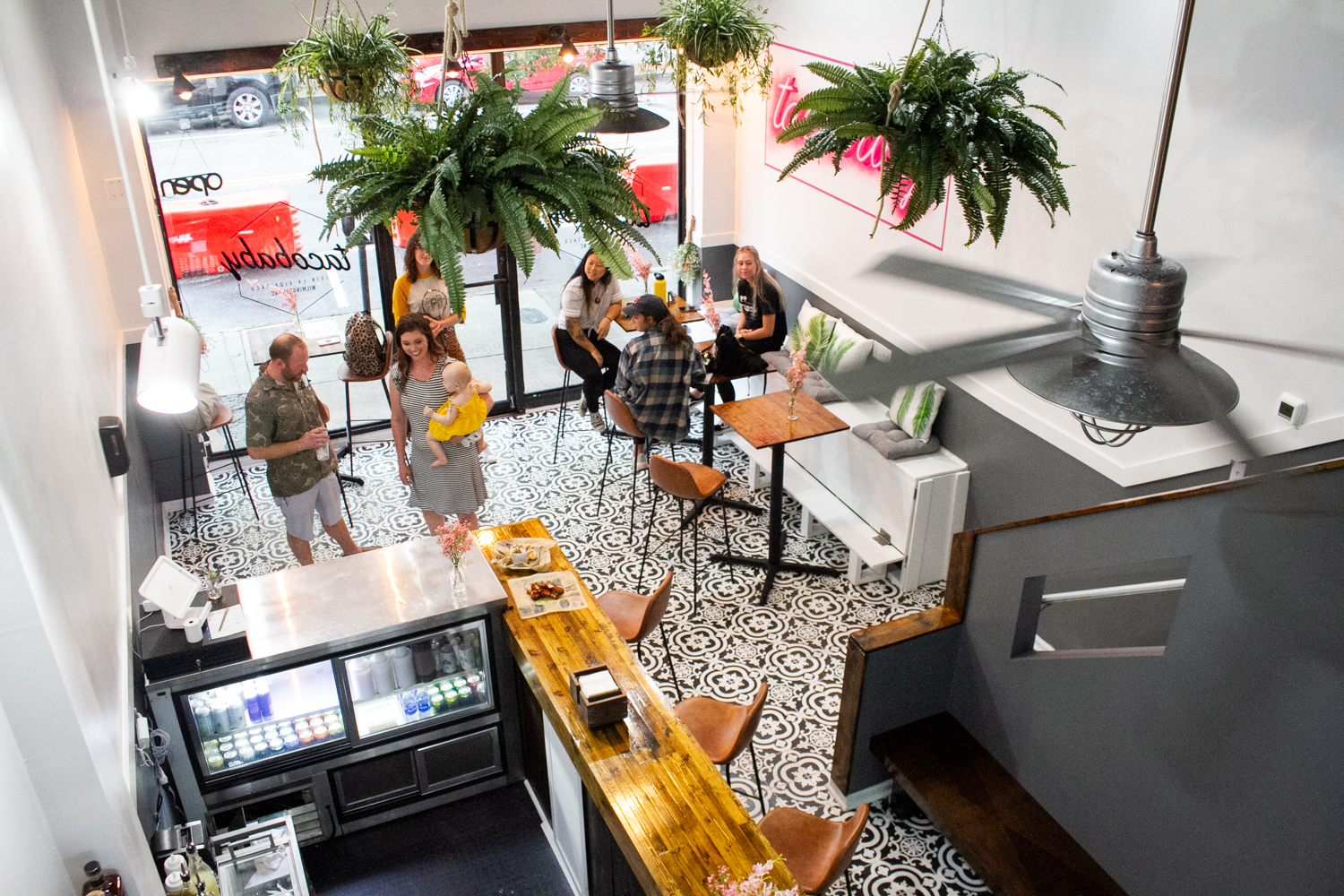 Tacobaby features a cozy, bright downstairs space paired with intimate upstairs seating. (Port City Daily photo/Johanna F. Still) 