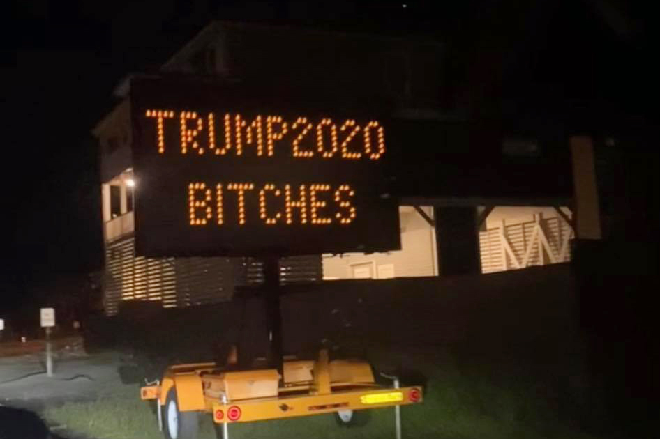 A photo originally posted to the Facebook group Oak Island NC Locals showed an information sign maintained by the Town of Oak Island was briefly hacked to display a vulgar message in support of President Donald J. Trump. (Port City Daily photo/Facebook)