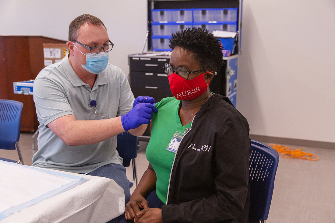 Panza Allen McNeill receives New Hanover County's first dose of the Moderna vaccine Tuesday afternoon. (Port City Daily photo/Courtesy New Hanover County)