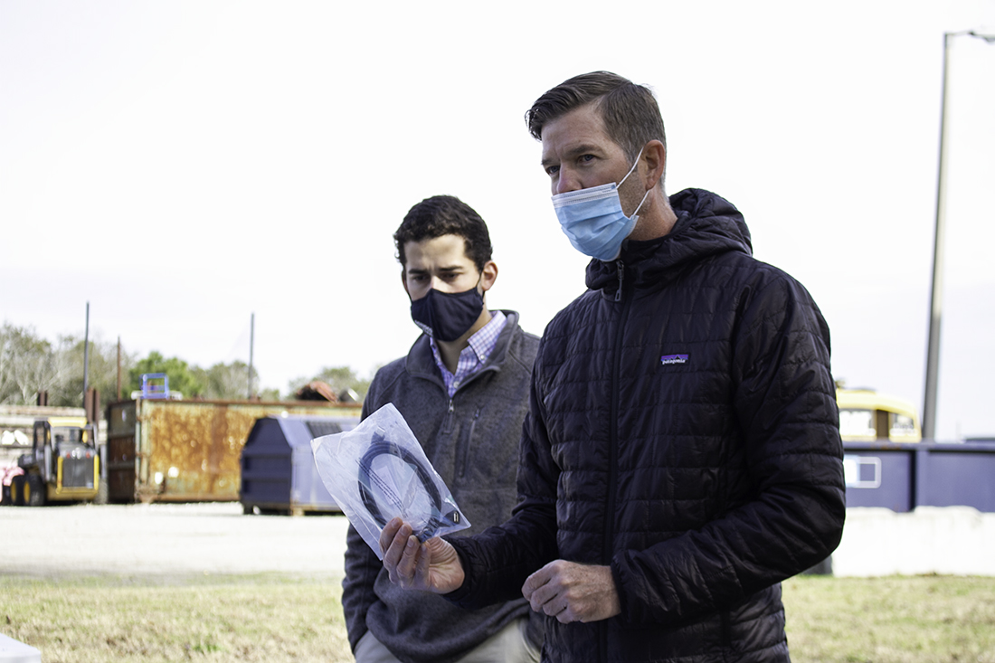 City of Wilmington sustainability manager David Ingram holds up electric wiring, an example of a "tangler," or item that can wind up equipment and cause difficulties at the county's recycling plant. (Port City Daily photo/Johanna F. Still)