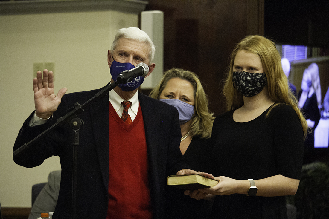 Bill Rivenbark swears his oath of office before taking his seat as a New Hanover County commissioner. (Port City Daily photo/Johanna F. Still)