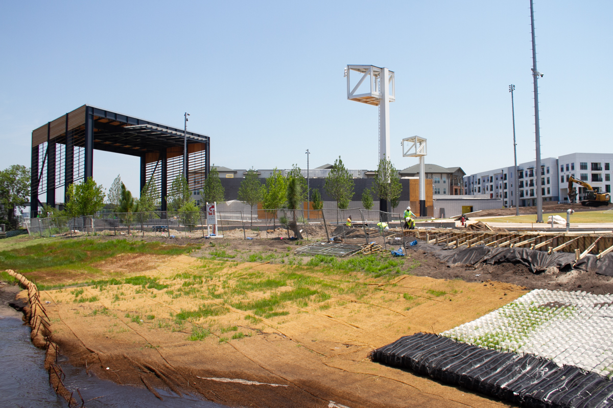 Contractors work on getting Riverfront Park ready for visitors as the City of Wilmington prepares for a Fourth of July grand opening. (Port City Daily photo/Johanna F. Still)