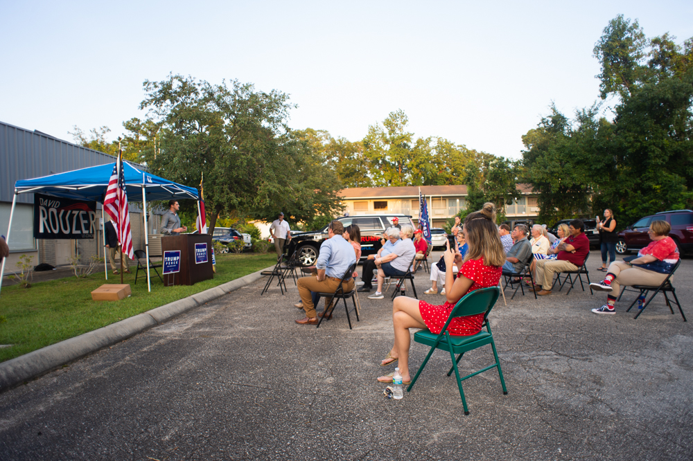 Attendees gather in the parking lot of the New Hanover County Republican Party office off Market Street on Wednesday evening. (Port City Daily photo/Mark Darrough)