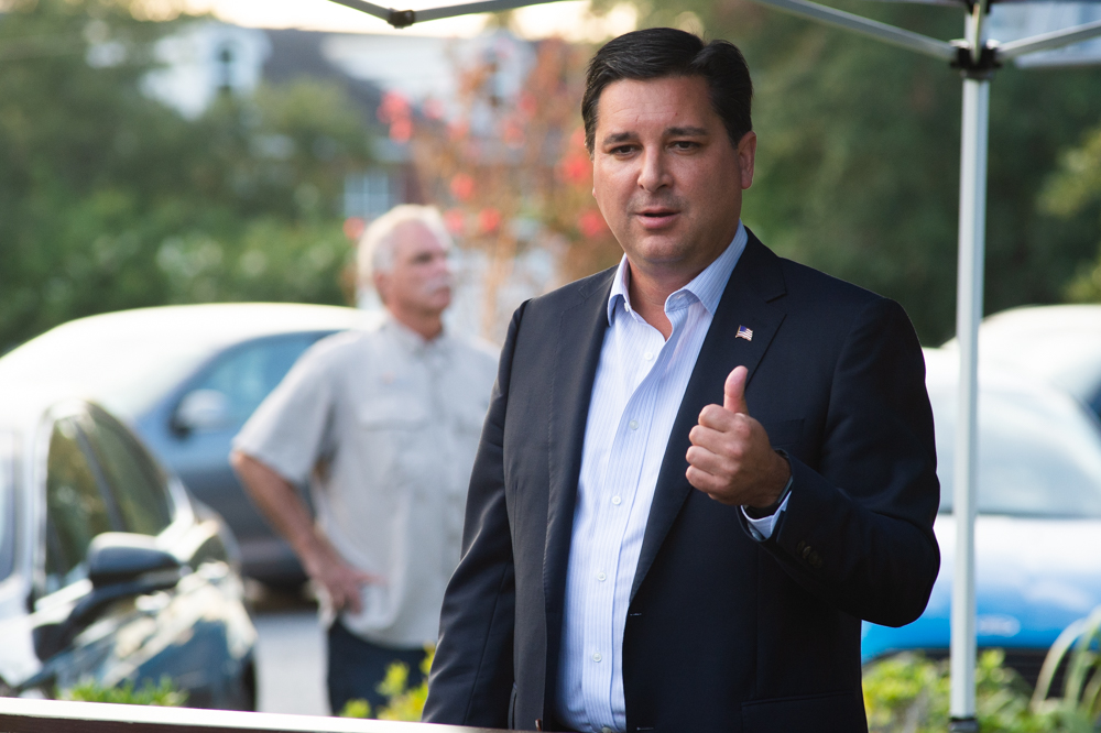 U.S. Representative David Rouzer, who represents North Carolina's 7th congressional district, speaks against the "hoax" investigations brought against the Trump administration, including recent reports that the U.S. Postal Service made policy changes that may delay mail-in ballots in coming months. (Port City Daily photo/Mark Darrough)